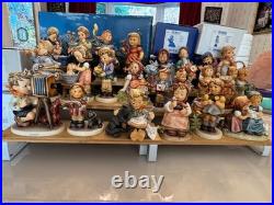 22 Goebel Hummels on BRAND NEW DISPLAY STAND- ALL MIB