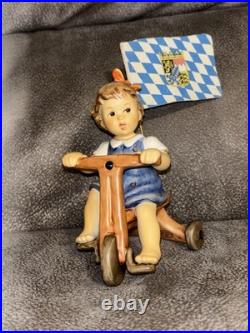 Goebel Hummel Figurine Look At Me With Bavarian Flag Girl On Tricycle RARE