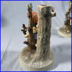 Highly collectible Goebel Hummel Girl In Tree With Bird Figurine 676