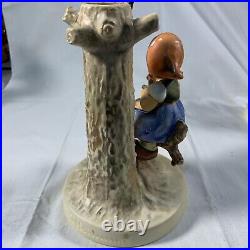 Highly collectible Goebel Hummel Girl In Tree With Bird Figurine 676