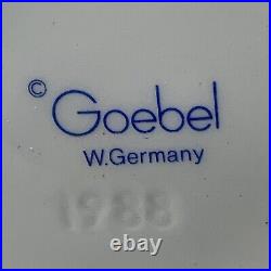 Highly collectible Goebel Hummel Girl In Tree With Bird Figurine 676
