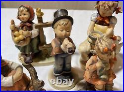 LOT OF 7 Vintage Hummel Goebel Sold As Picture And One Piece Is Damaged