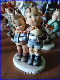 Lot OF 11 Hummel Goebel Porcelain Figure includes the wanderer and ski. Bonus