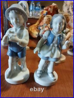 Lot OF 11 Hummel Goebel Porcelain Figure includes the wanderer and ski. Bonus