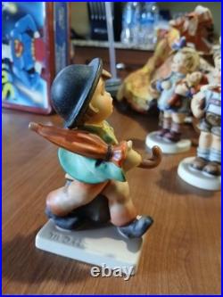 Lot OF 11 Hummel Goebel Porcelain Figure includes the wanderer and ski. Bonus