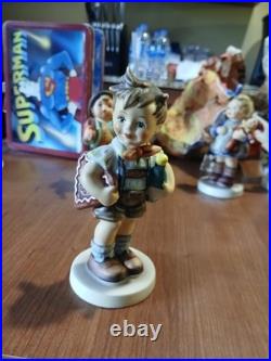 Lot OF 11 Hummel Goebel Porcelain Figure includes the wanderer and ski. Bonus