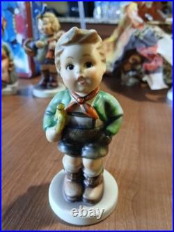 Lot OF 11 Hummel Goebel Porcelain Figure includes the wanderer and ski. Bonus