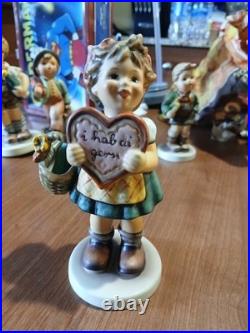 Lot OF 11 Hummel Goebel Porcelain Figure includes the wanderer and ski. Bonus