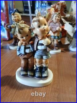 Lot OF 11 Hummel Goebel Porcelain Figure includes the wanderer and ski. Bonus