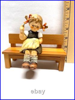 M I Hummel Goebel Nimble Fingers girl on wooden bench cross stitching HUM 758