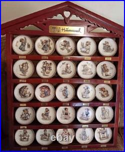 M. I. Hummel Wood Wall Rack With 25 Hummel Mini Plates, 1971-1995