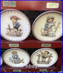 M. I. Hummel Wood Wall Rack With 25 Hummel Mini Plates, 1971-1995