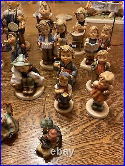 Vintage lot of 18 Hummel porcelain figurines. Goebel W. Germany
